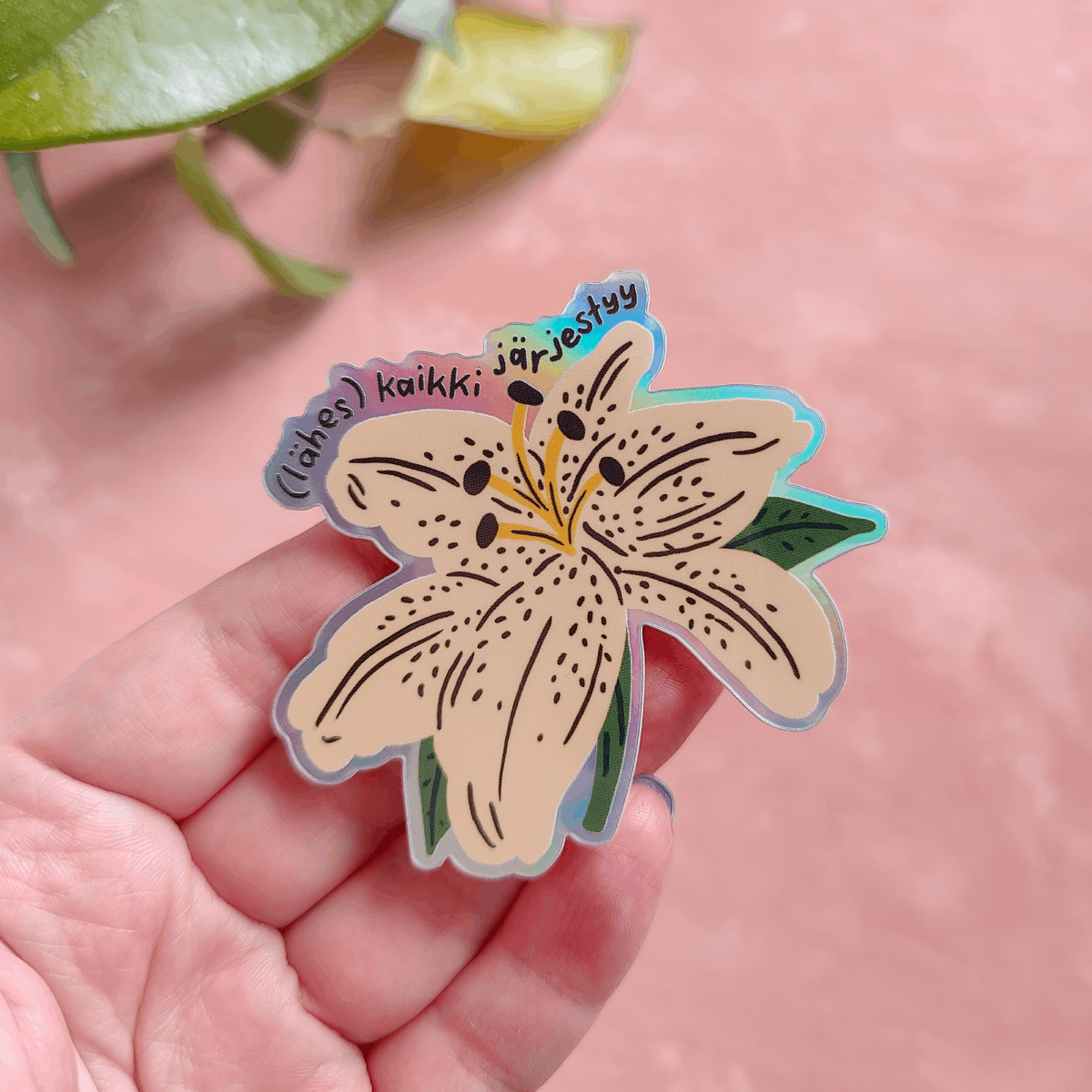 Kaikki järjestyy | Holograafinen tarra