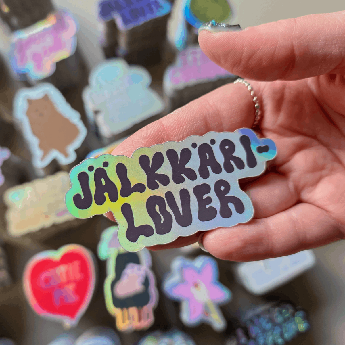 Jälkkärilover | Holograafinen tarra